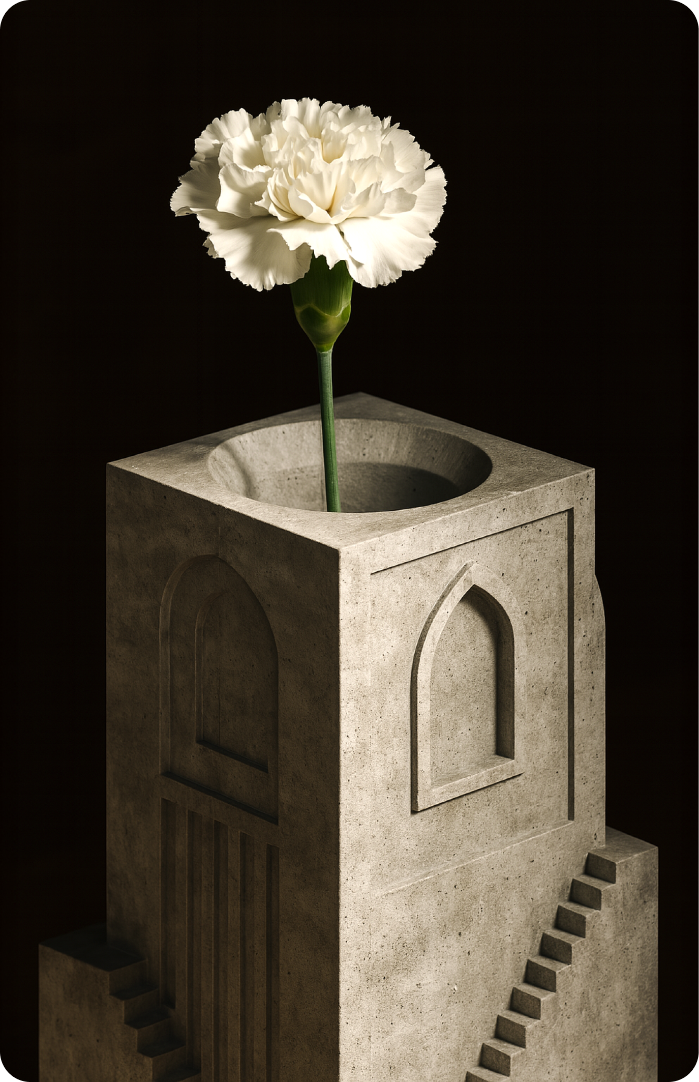 Architectural cement flower vase holding a white flower