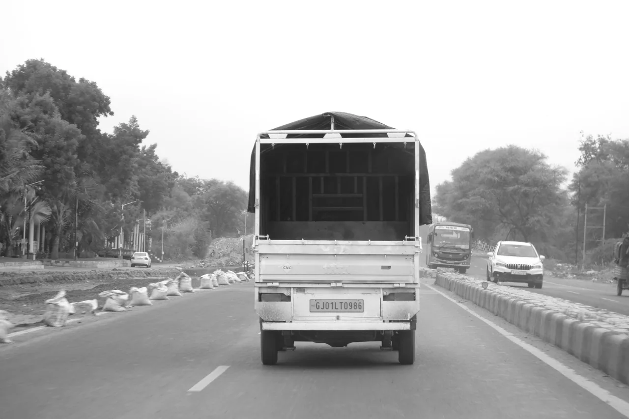 A goods vehicle travelling ahead on a divided highway