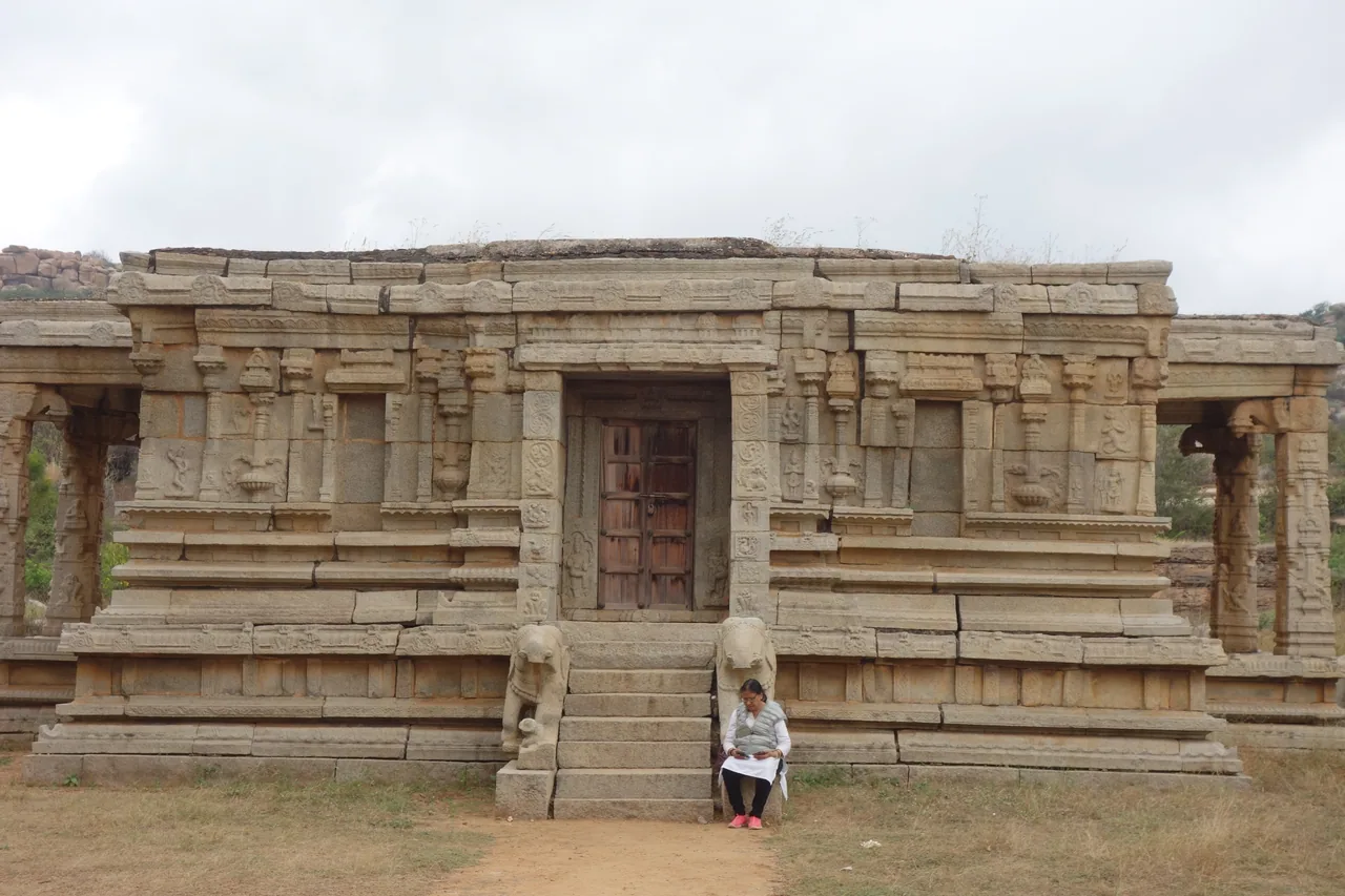 A carved stone temple facade and entrance steps